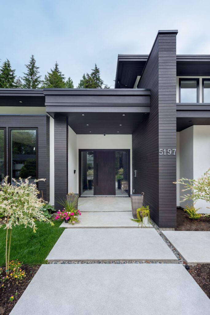 Dark wood cladding at a modern home entry
