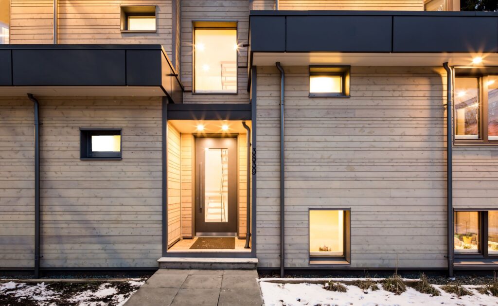Horizontal wood cladding at a front entry