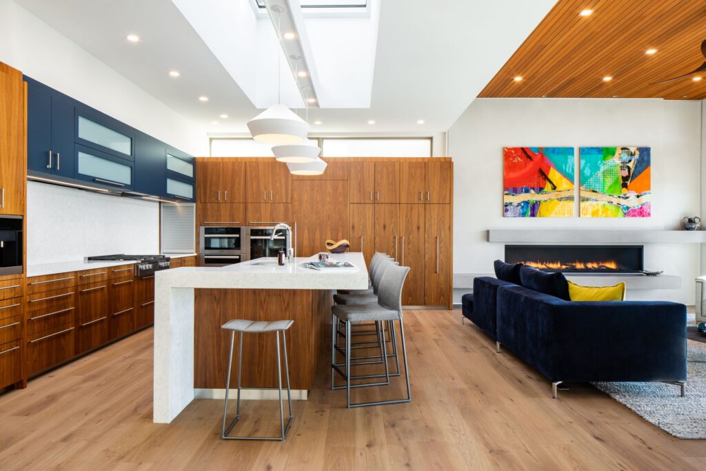 Wood ceiling above an open kitchen and living room
