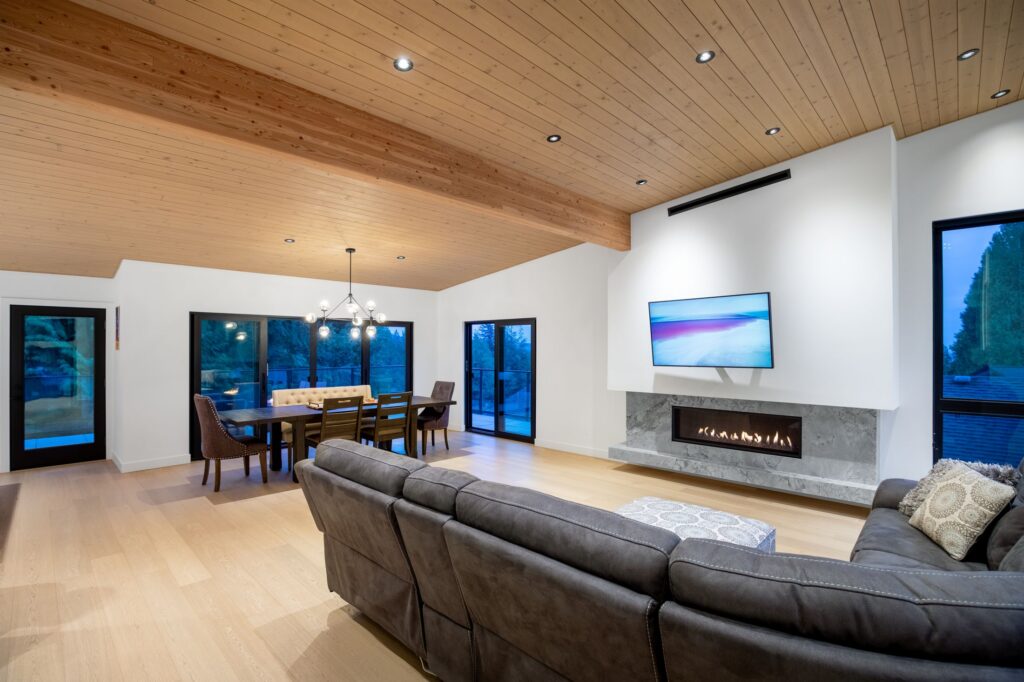 Wood ceiling over an open living and dining room