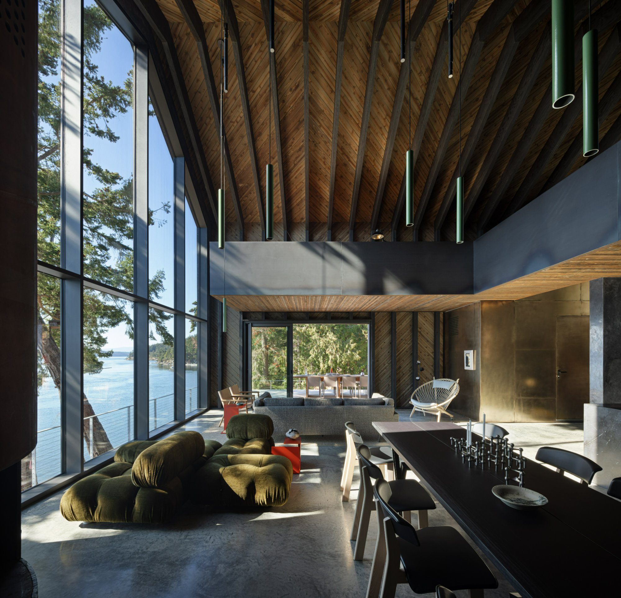 Wood ceiling over a living room with a water view